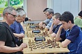 За шахматной доской — школьники и ветераны